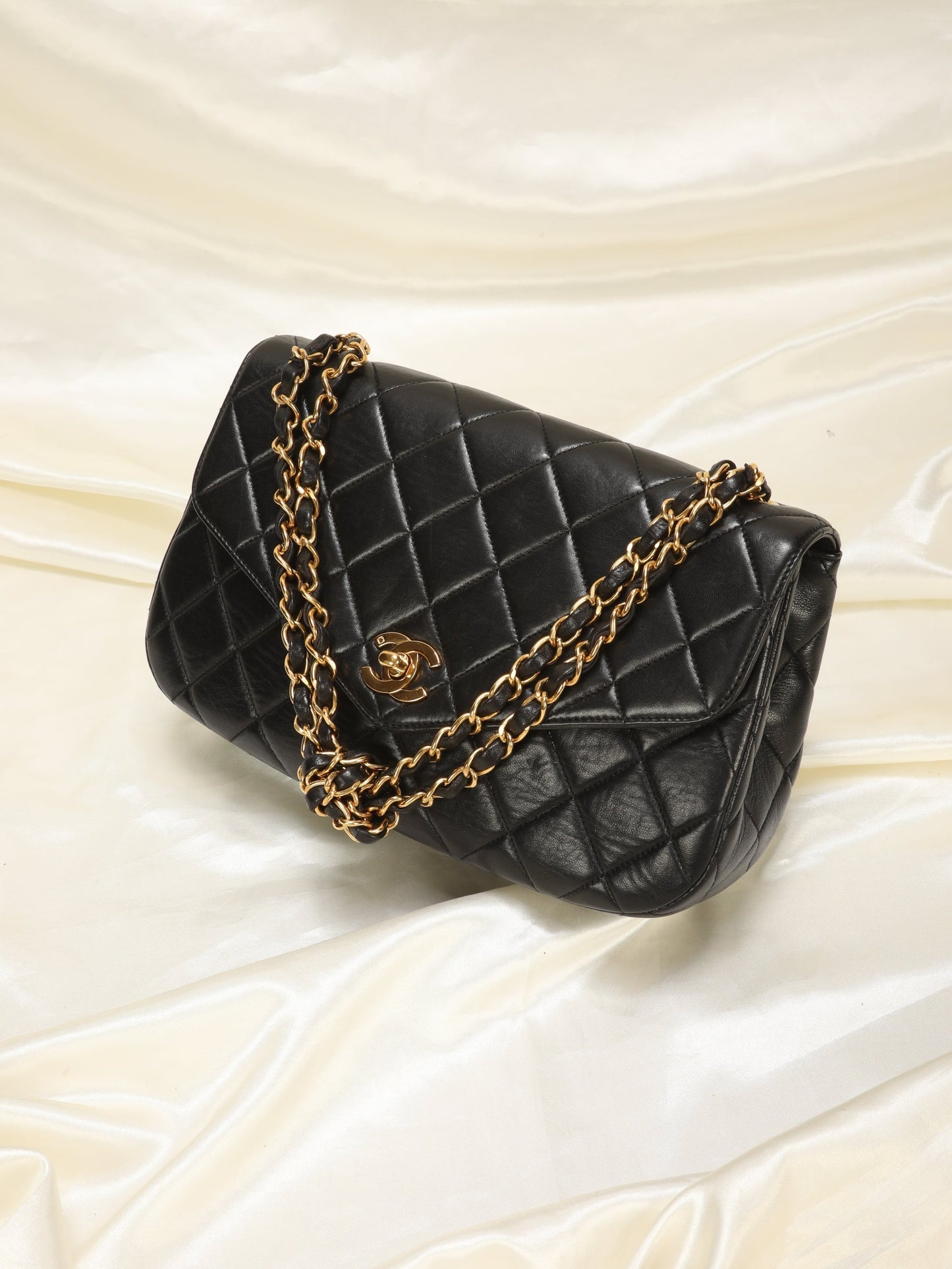 Extremely Rare Chanel Lambskin Knotted Half Flap