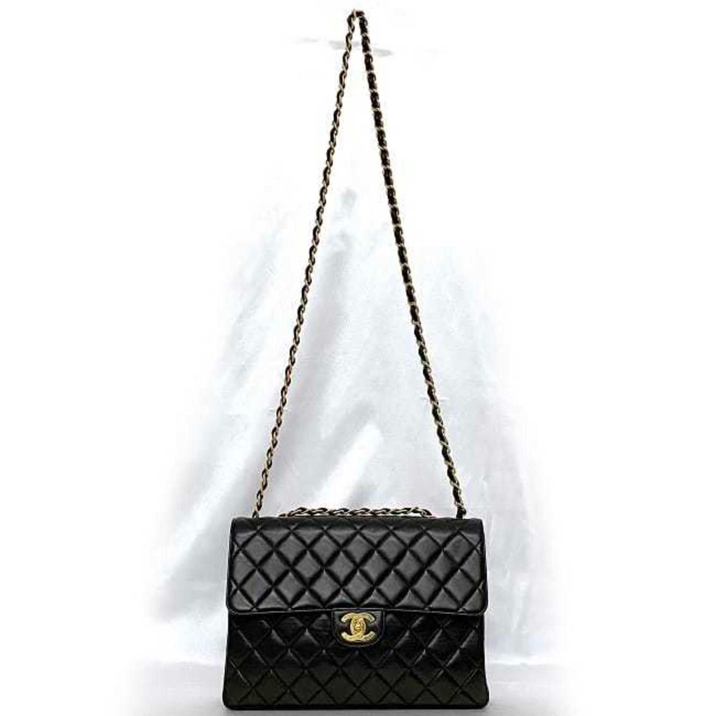 Chanel Sac Chain Flap en cuir noir