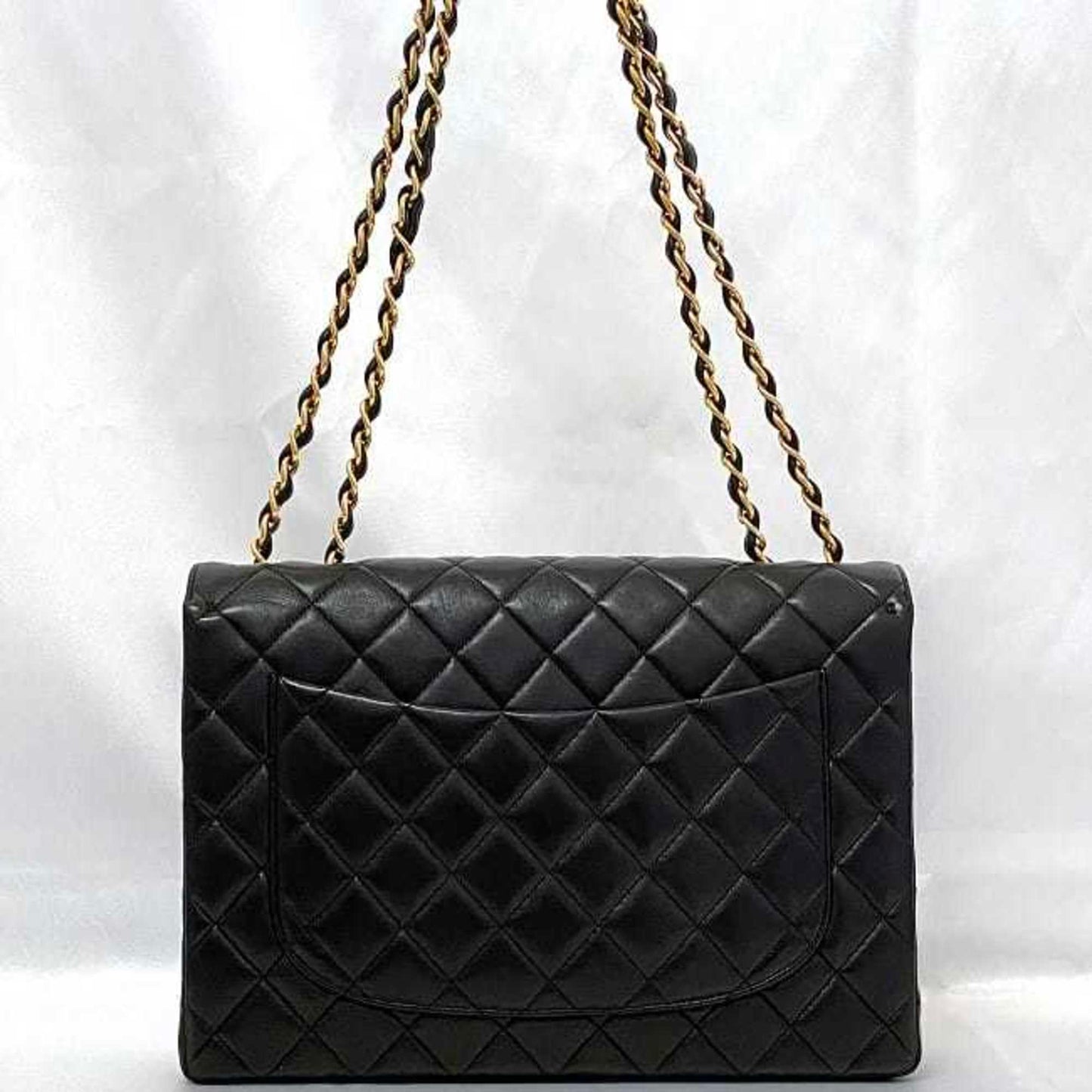 Chanel Sac Chain Flap en cuir noir