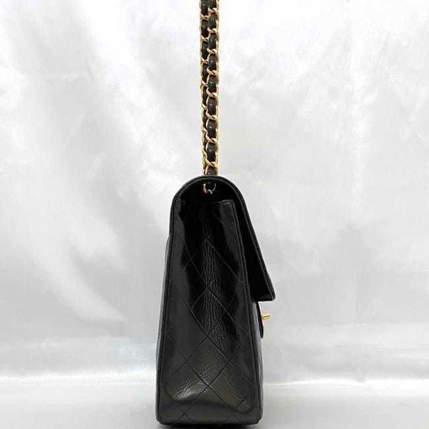 Chanel Sac Chain Flap en cuir noir