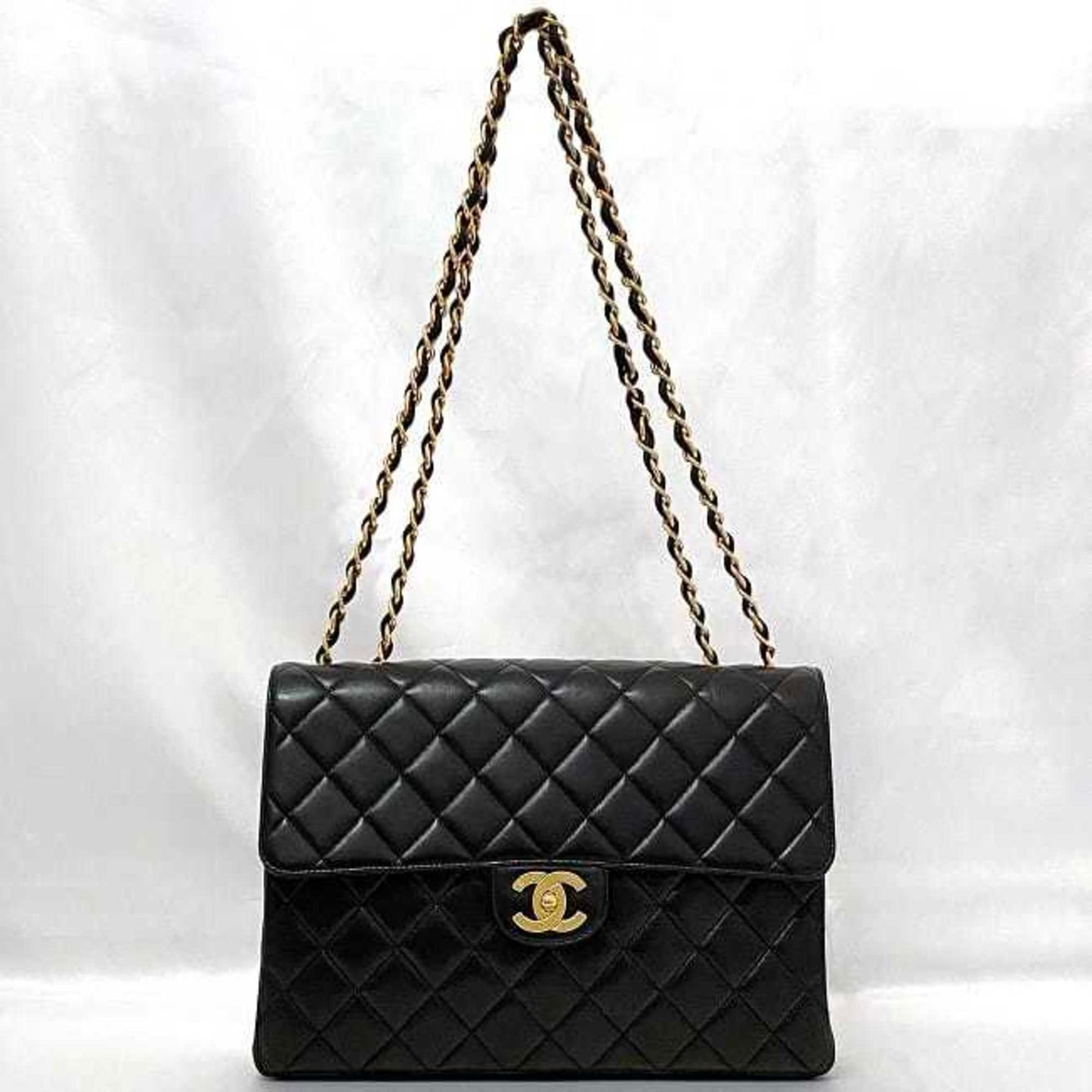 Chanel Sac Chain Flap en cuir noir
