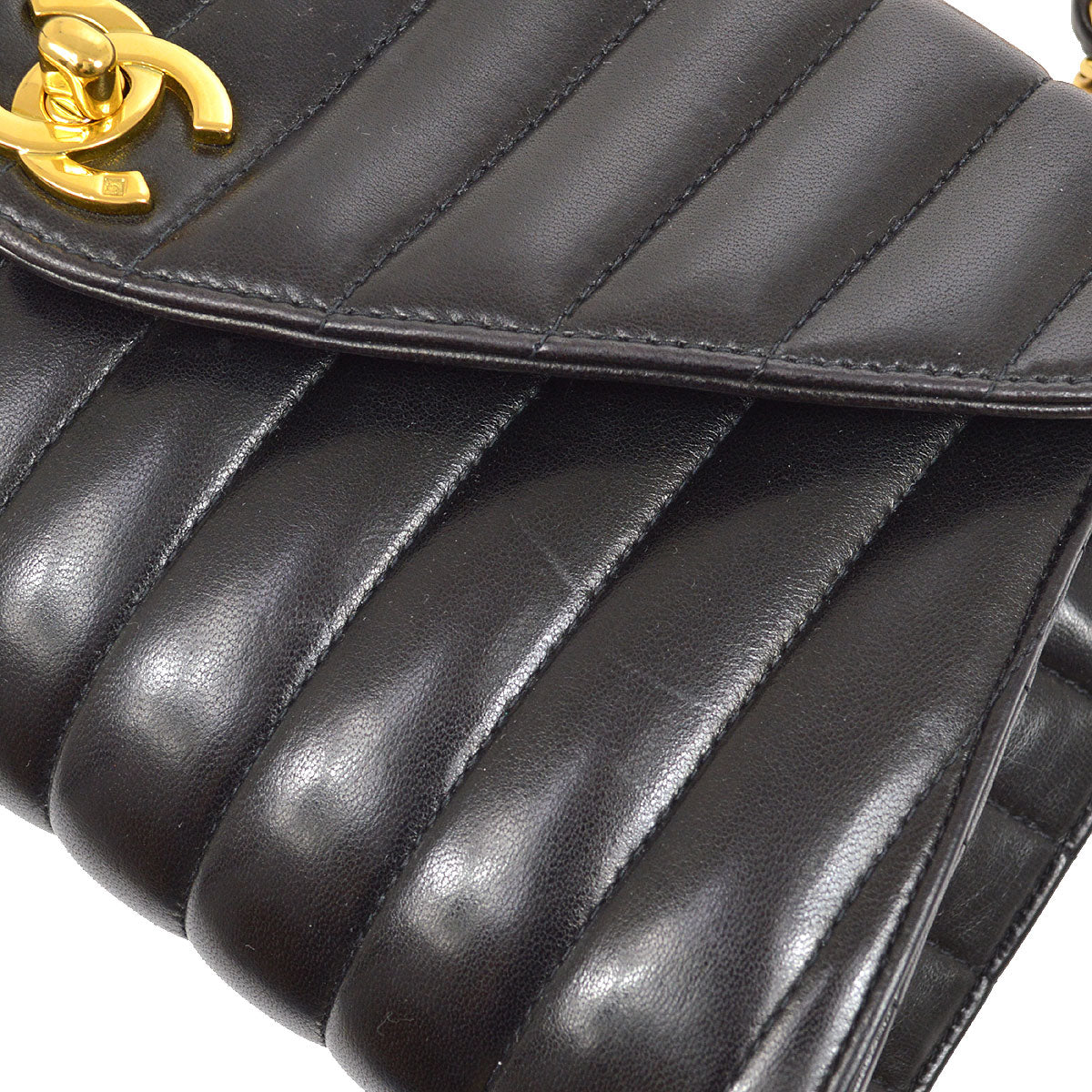CHANEL 1994-1996 Black Lambskin Vertical Evening Bag