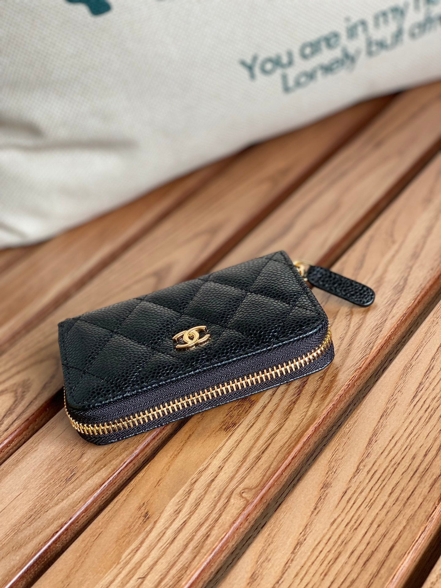 CHANEL zipped wallet 7.5cm black caviar gold hardware