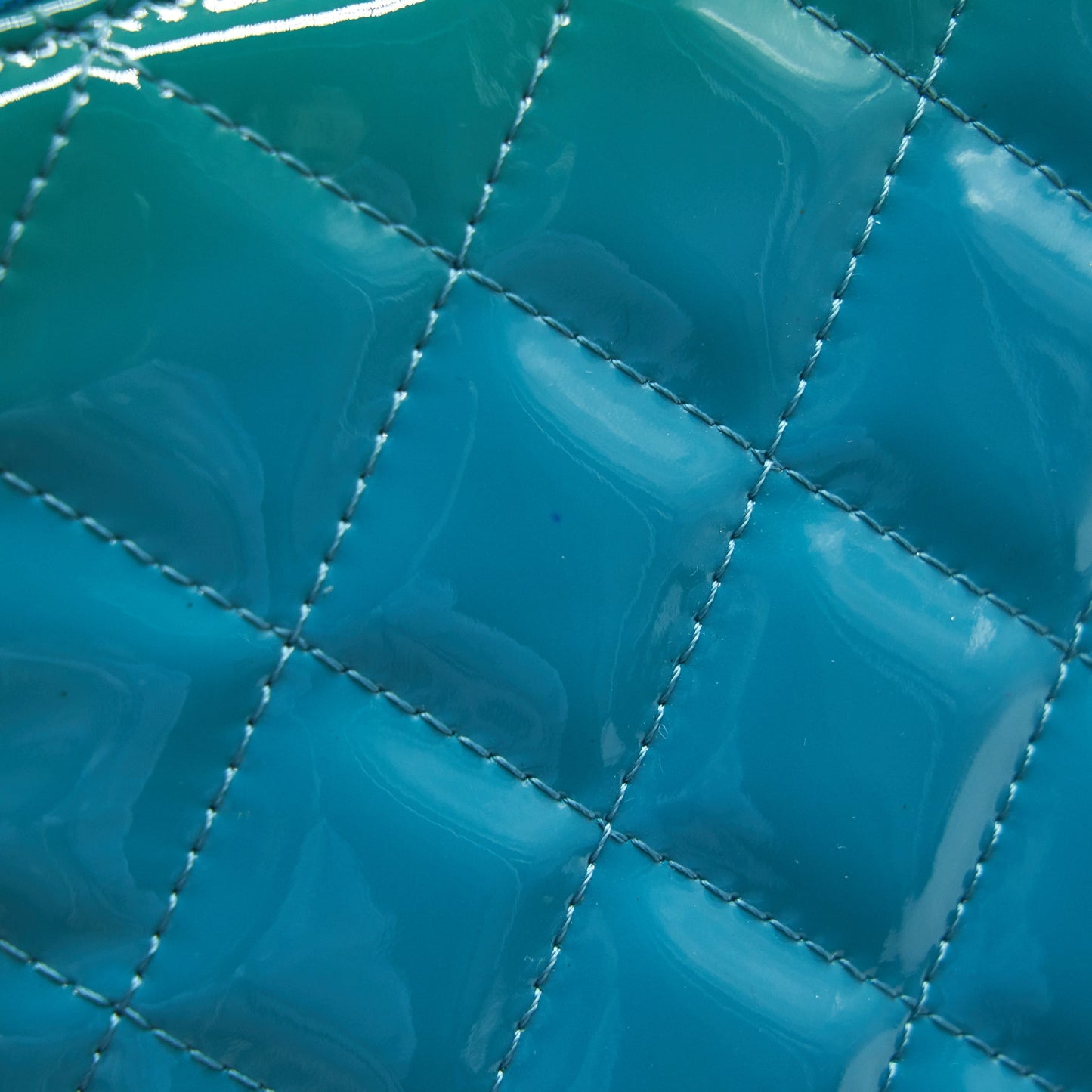 CHANEL QUILTED LEATHER CLUTCH BAG IN PATENT BLUE
