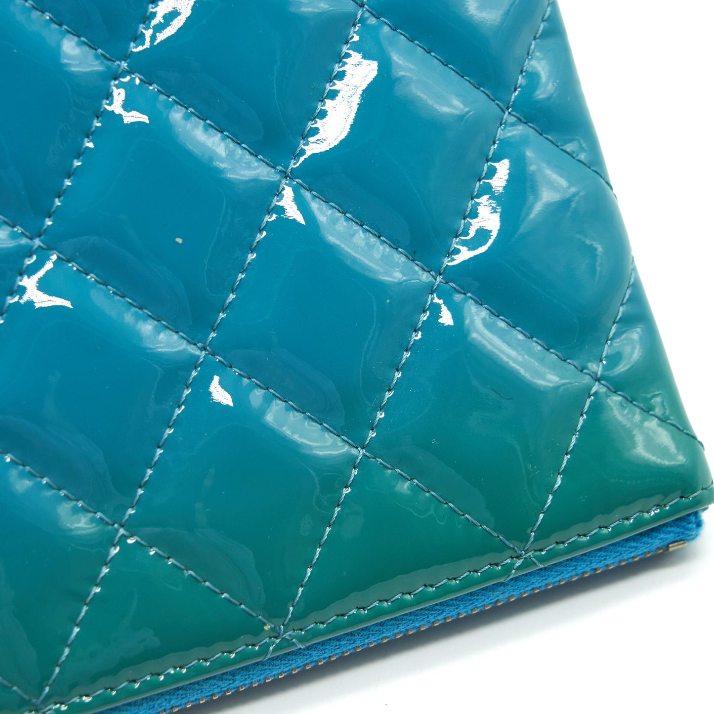 CHANEL QUILTED LEATHER CLUTCH BAG IN PATENT BLUE