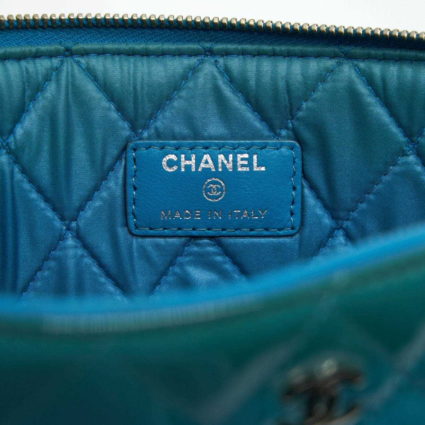 CHANEL QUILTED LEATHER CLUTCH BAG IN PATENT BLUE