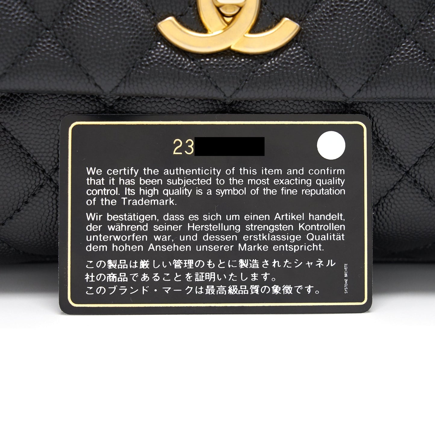 CHANEL CAVIER MEDIUM COCO HANDLE FLAP BAG BLACK
