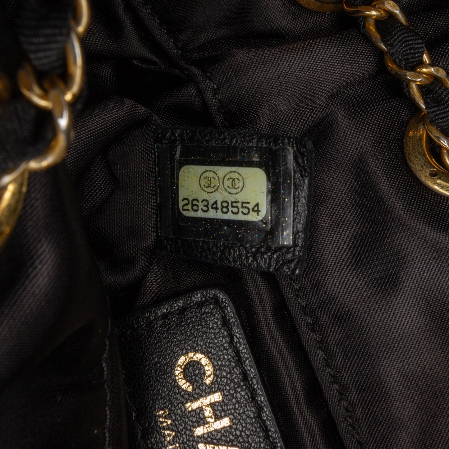 Black Chanel Quilted Nylon Crystal CC Drawstring Sling Bag