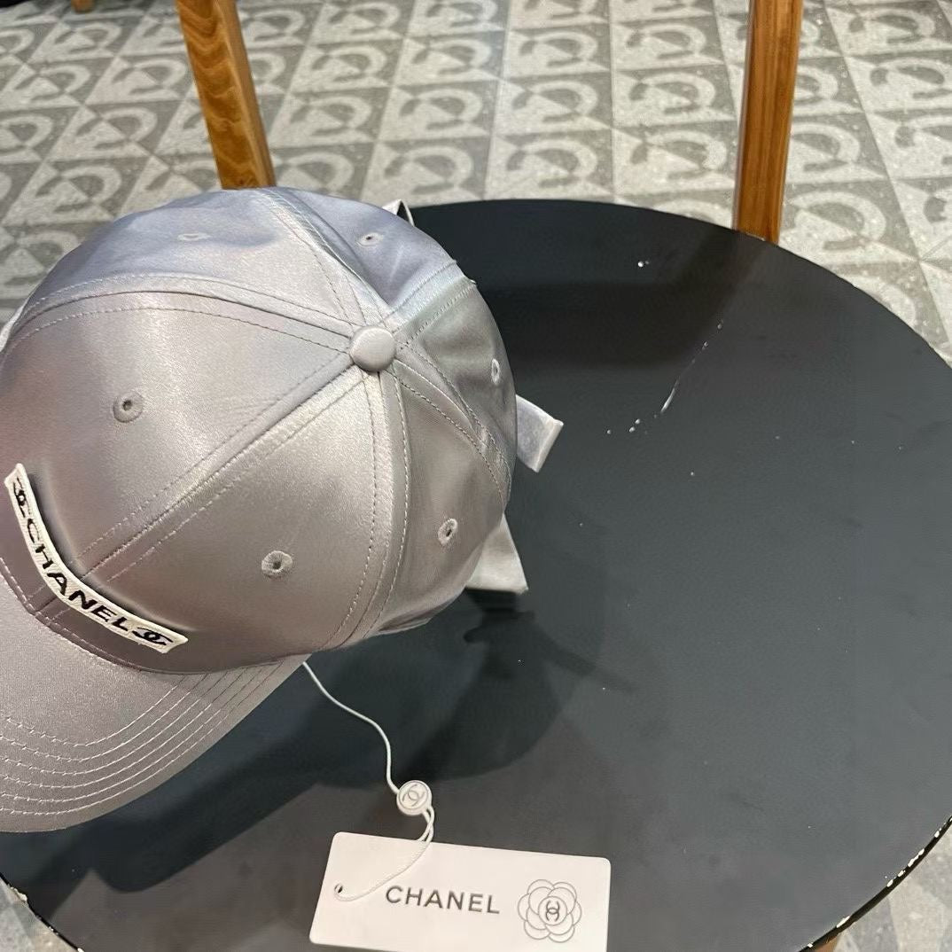 CHANEL BASEBALL HAT IN SILVER SILK SATIN 404865