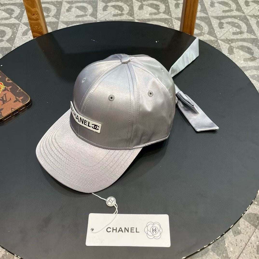CHANEL BASEBALL HAT IN SILVER SILK SATIN 404865