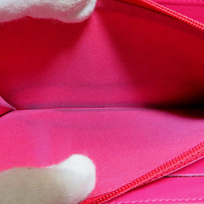 Chanel Camellia Round Zip Wallet