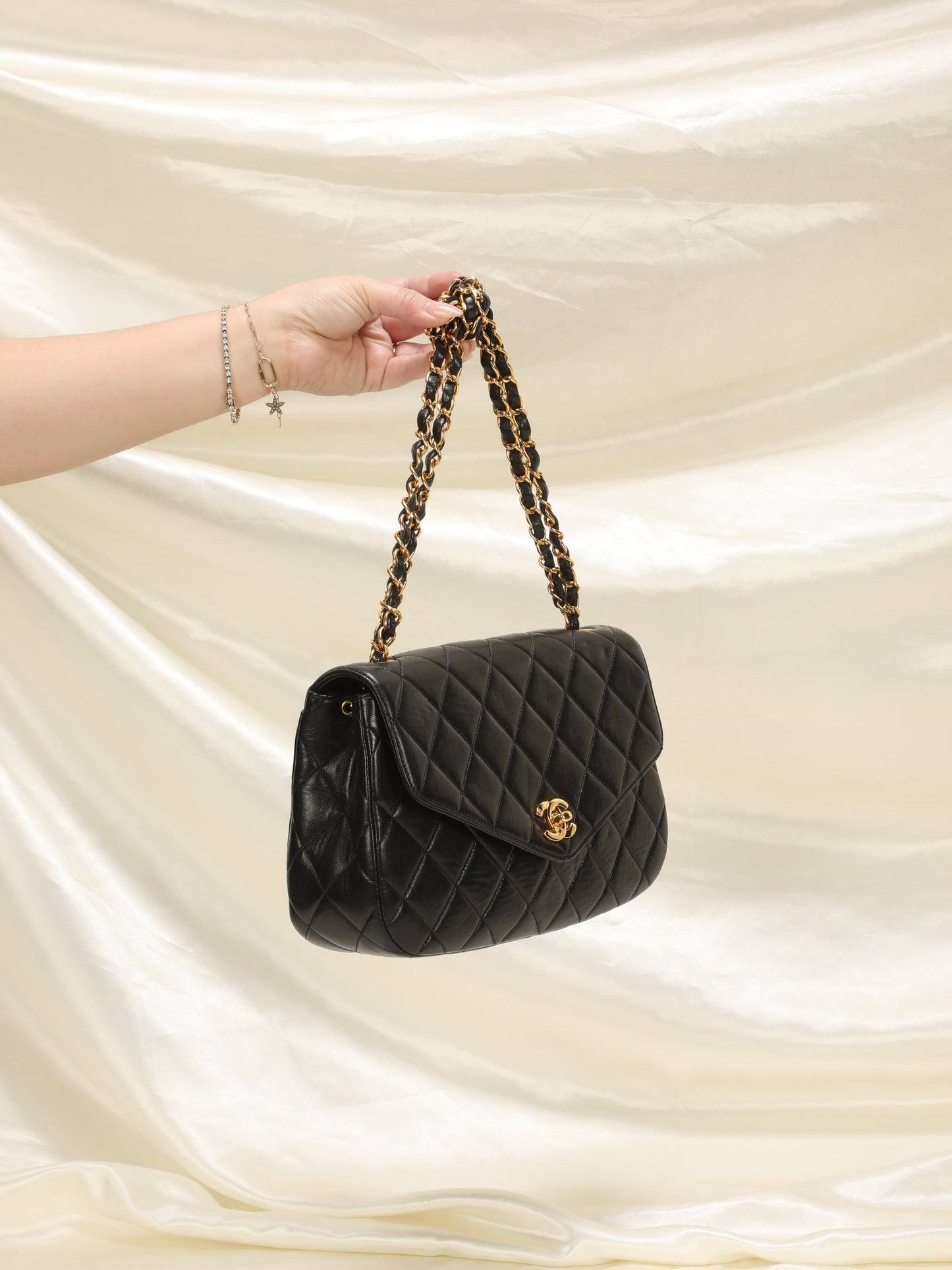Extremely Rare Chanel Lambskin Knotted Half Flap