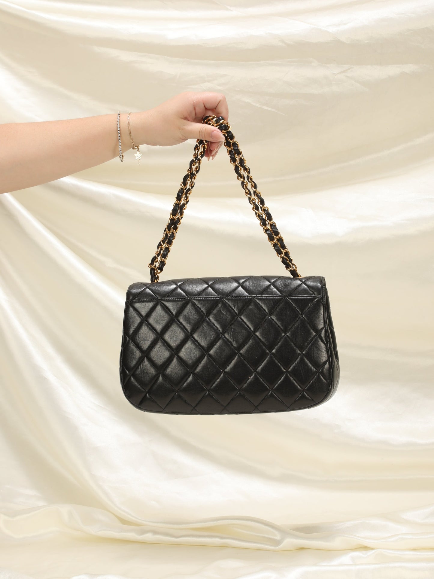 Extremely Rare Chanel Lambskin Knotted Half Flap