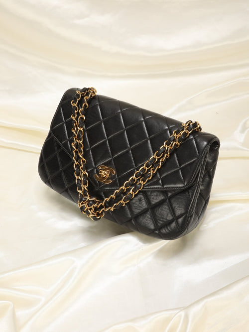Extremely Rare Chanel Lambskin Knotted Half Flap