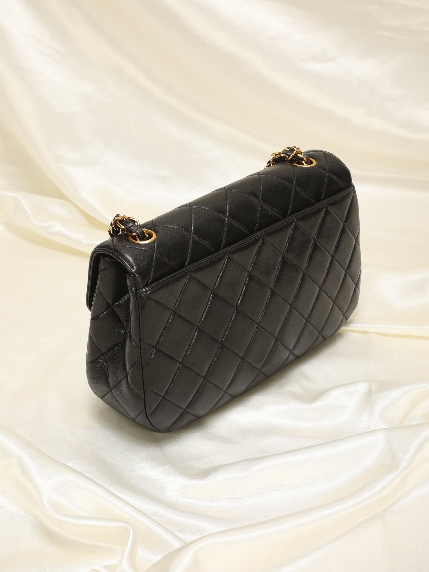 Extremely Rare Chanel Lambskin Knotted Half Flap