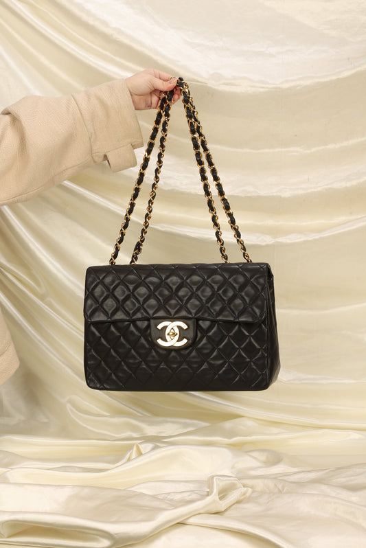 Chanel Maxi XL Logo Flap Bag