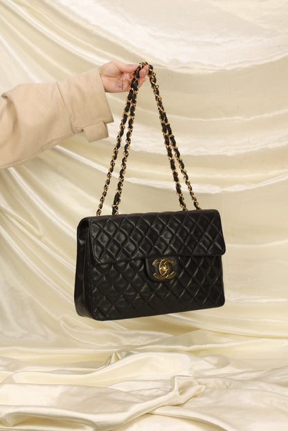 Chanel Maxi XL Logo Flap Bag