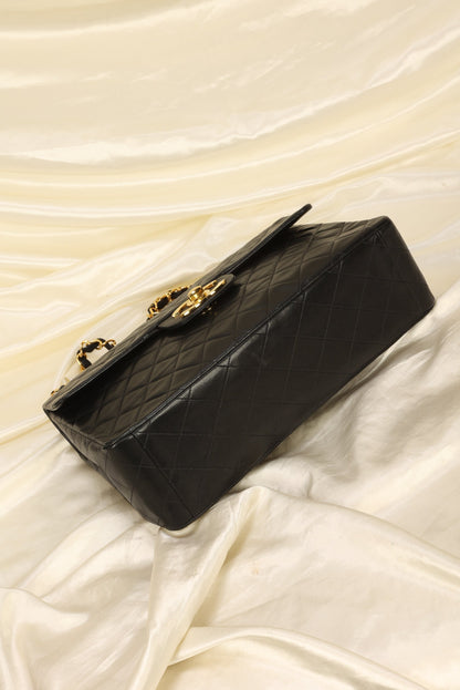 Chanel Maxi XL Logo Flap Bag