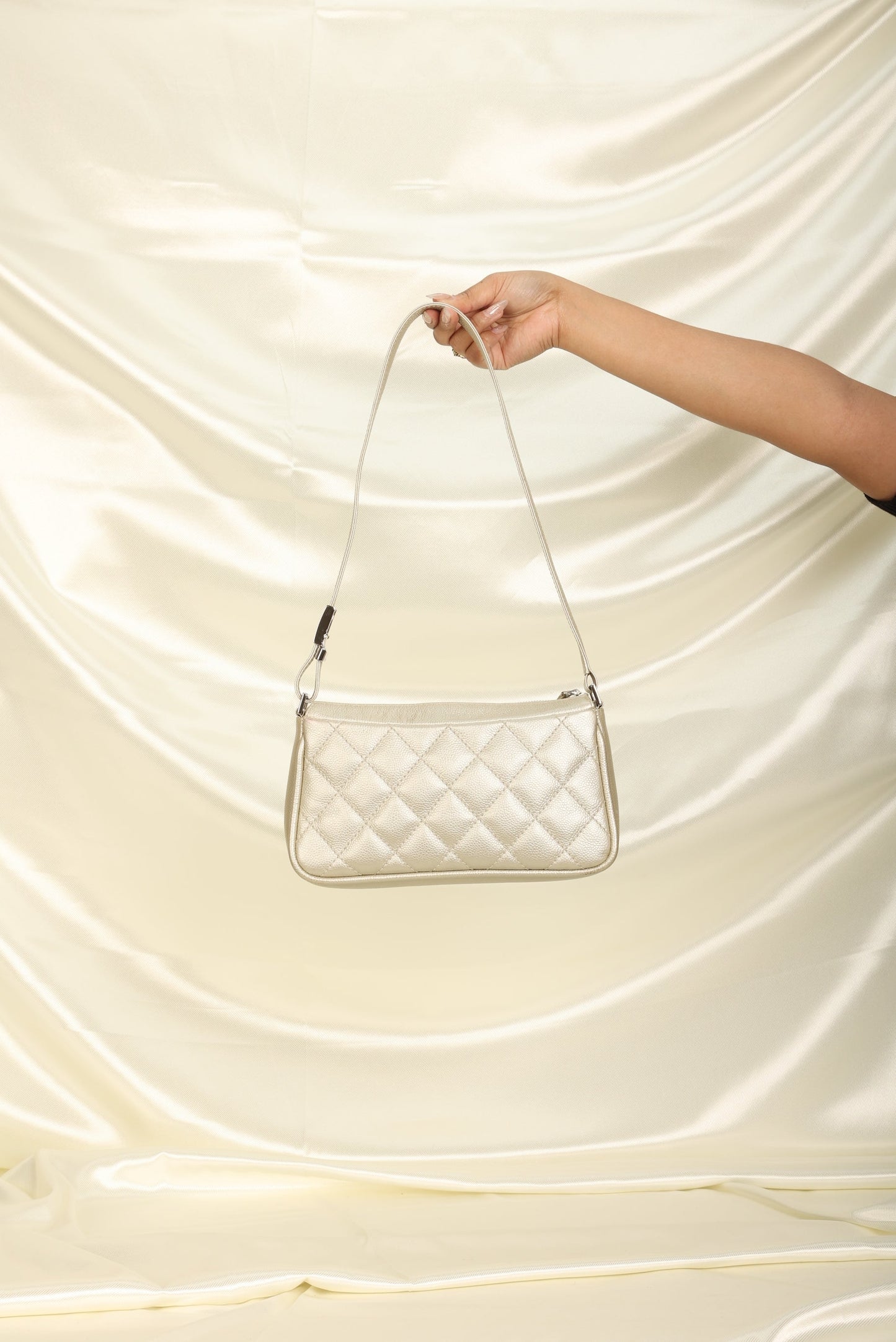 Chanel Metallic Caviar Pochette