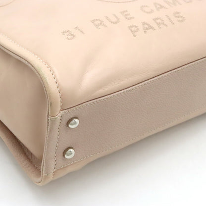 Chanel Sac Deauville en cuir beige