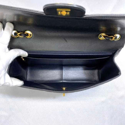 Chanel Sac Chain Flap en cuir noir