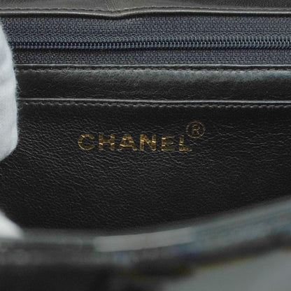Chanel Sac Mademoiselle en cuir verni noir