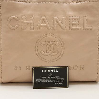 Chanel Sac Deauville en cuir beige