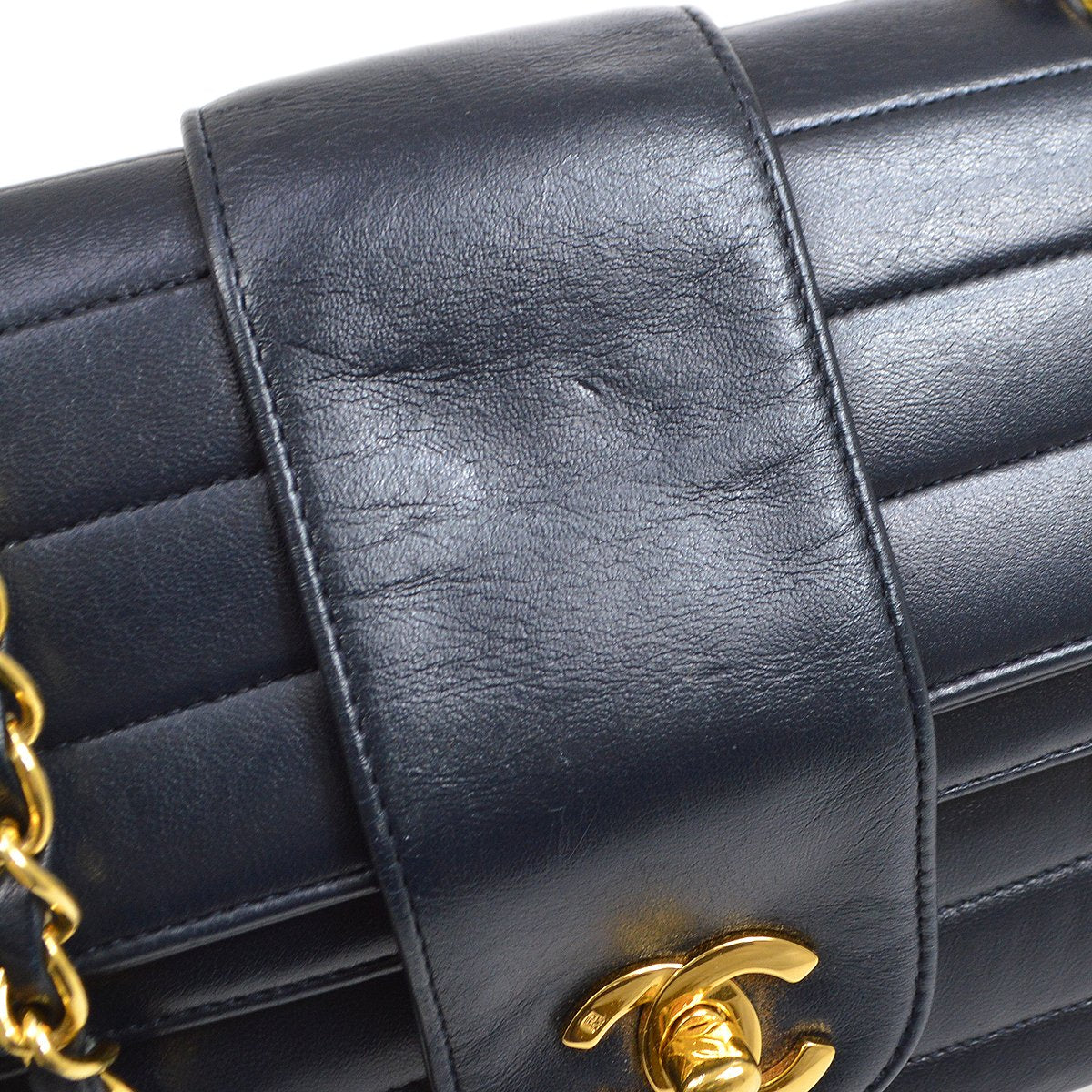 CHANEL 1991-1994 Vertical Flap Small Navy Lmabskin