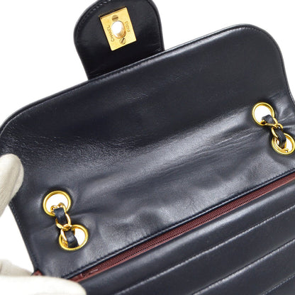 CHANEL 1991-1994 Vertical Flap Small Navy Lmabskin