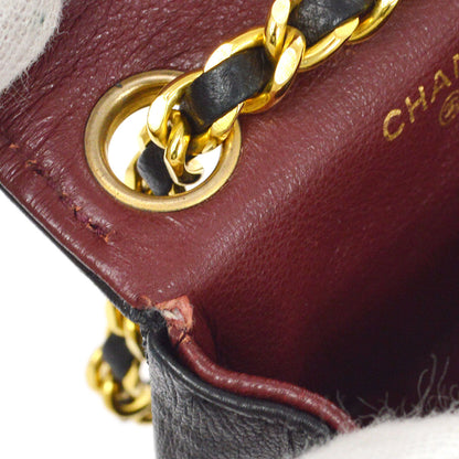 CHANEL 1990s Black Lambskin Belt Bag Micro