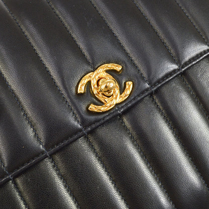 CHANEL 1991-1994 Black Lambskin Vertical Flap Bag Small