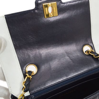 CHANEL 1991-1994 Vertical Border Flap Mini Navy Lambskin