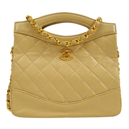 CHANEL 1989-1991 Beige Lambskin handbag mini
