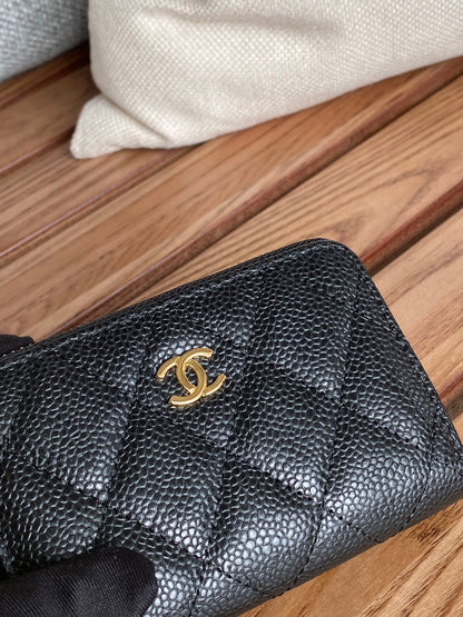 CHANEL zipped wallet 7.5cm black caviar gold hardware