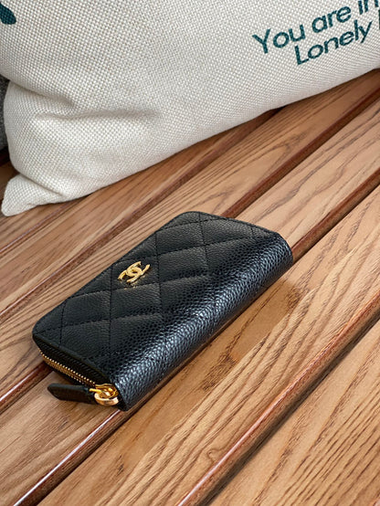 CHANEL zipped wallet 7.5cm black caviar gold hardware