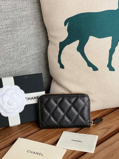 CHANEL zipped wallet 7.5cm black caviar gold hardware