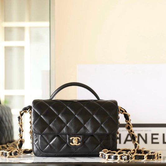 CHANEL 24a flap bag 20cm top handle black  lambskin gold hardware