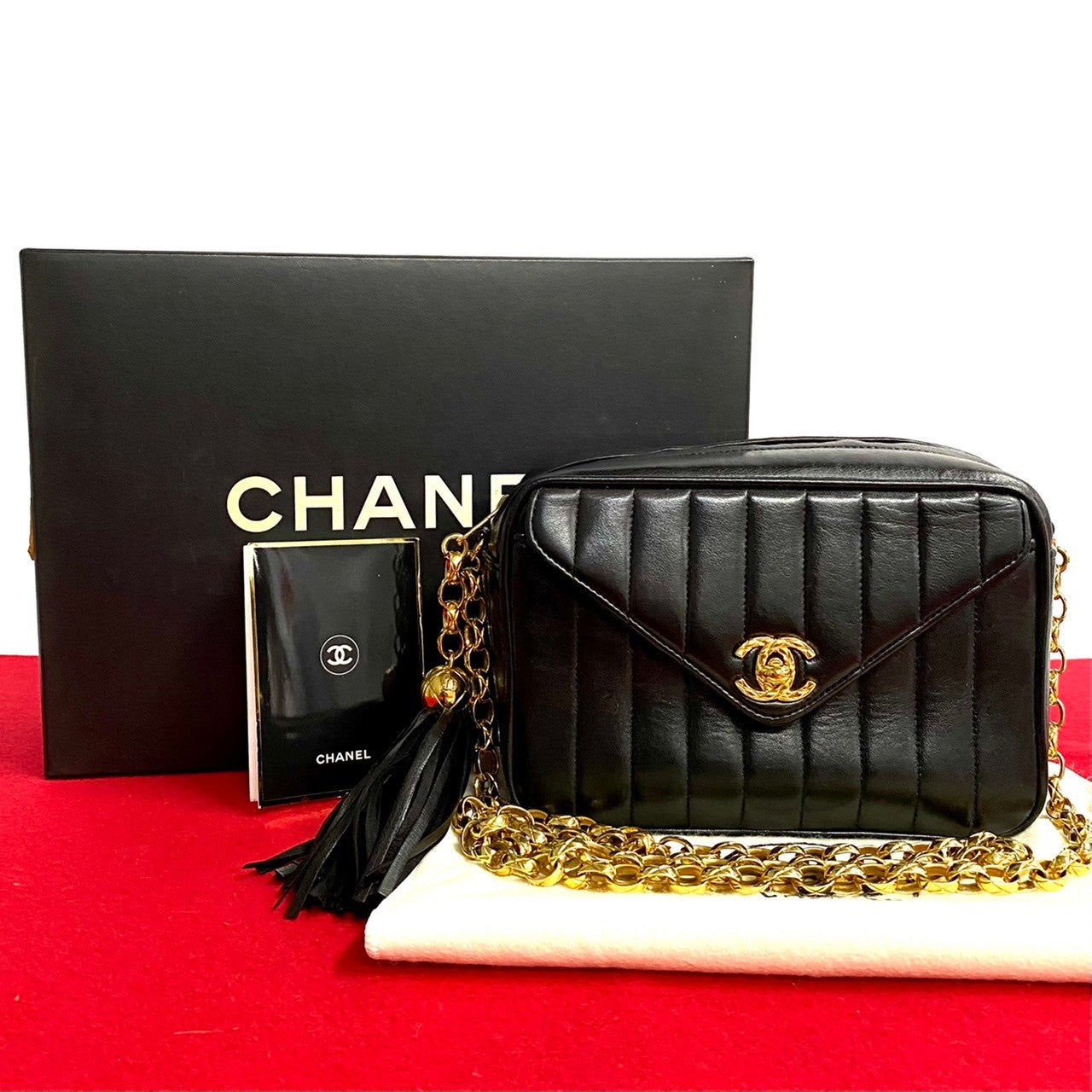 Chanel CC Vertical Quilted Flap Camera Bag  Leather Crossbody Bag