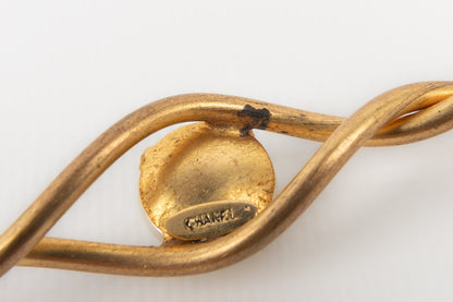 Broche dore Chanel