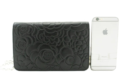 CHANEL Black Camellia Embossed Wallet On Chain WOC Shoulder Bag k53