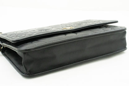 CHANEL Black Camellia Embossed Wallet On Chain WOC Shoulder Bag k53