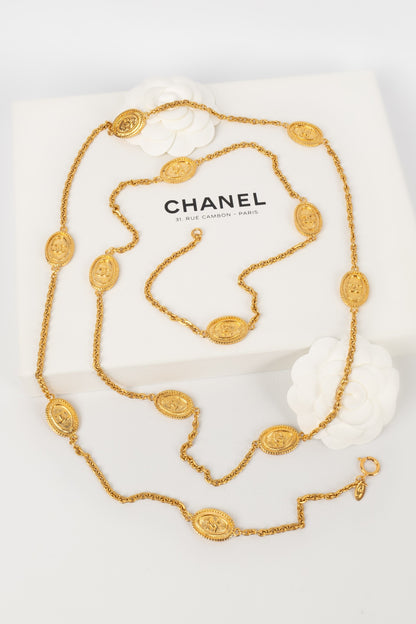Collier / Sautoir en mtal dor Chanel 1980's