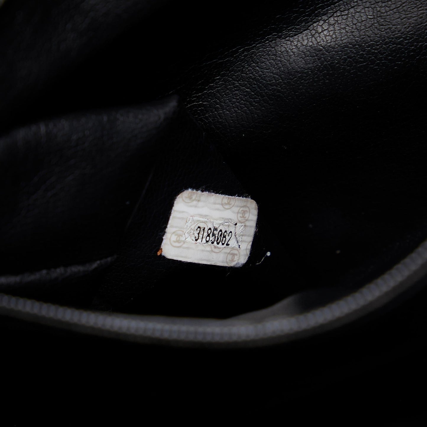 Chanel CC Quilted Lambskin Drawstring Backpack (SHG-86DOIB)