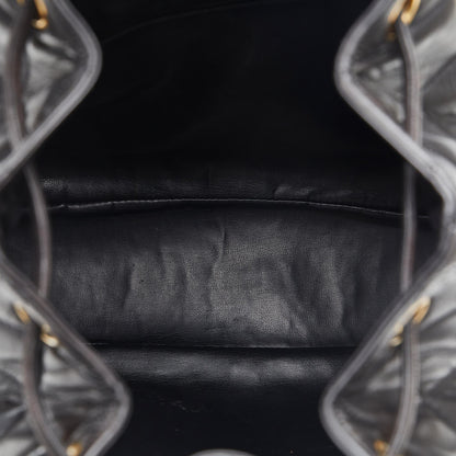 Chanel CC Quilted Lambskin Drawstring Backpack (SHG-86DOIB)