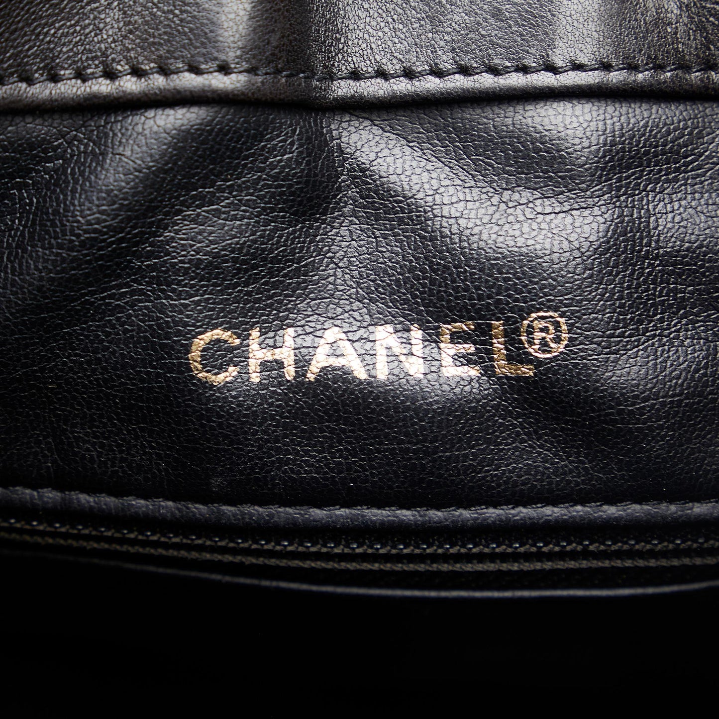 Chanel CC Quilted Lambskin Drawstring Backpack (SHG-86DOIB)