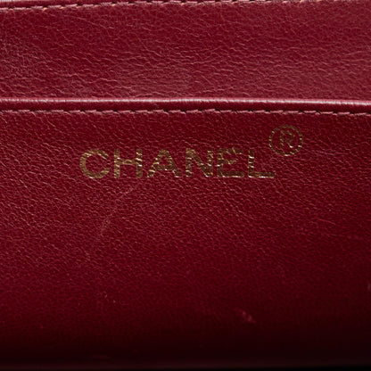 Chanel Maxi Classic Lambskin Double Flap (SHG-EmVxmM)