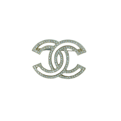 Chanel CC golden brooch rhinestones
