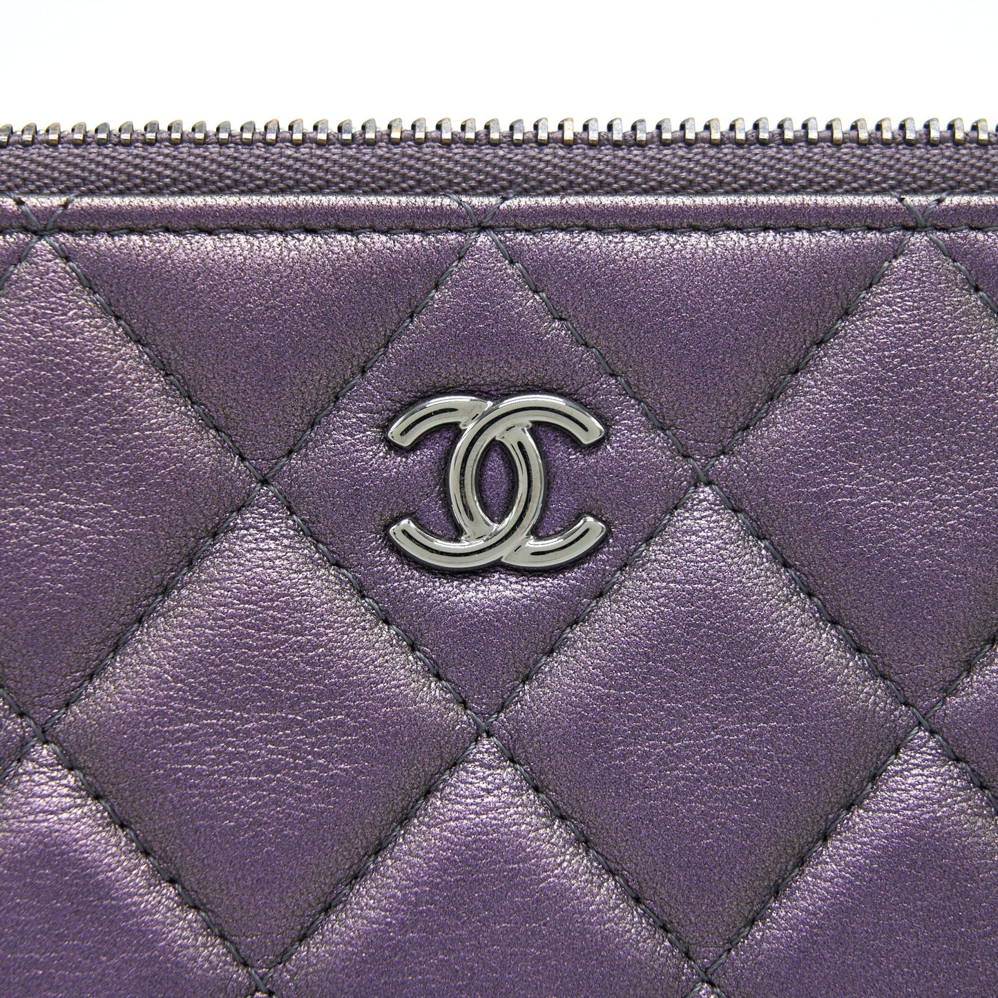 Chanel Quilted Leather Clutch Bag in Metallic Purple