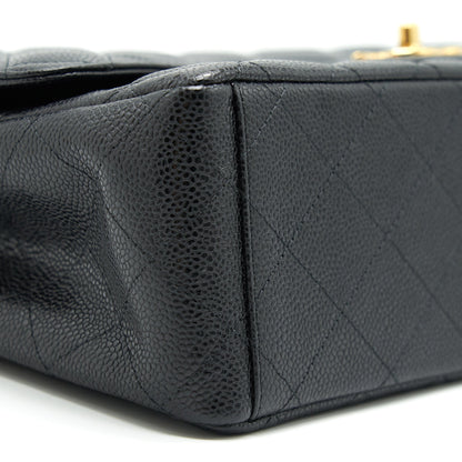 Chanel Maxi Classic double Flap Black Caviar GHW