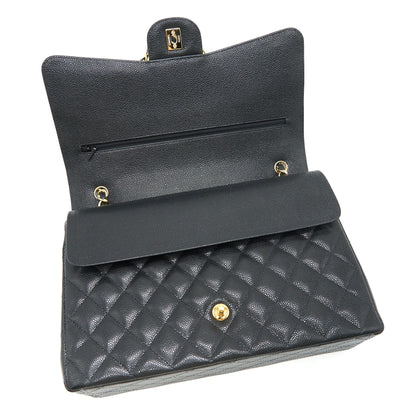 Chanel Maxi Classic double Flap Black Caviar GHW